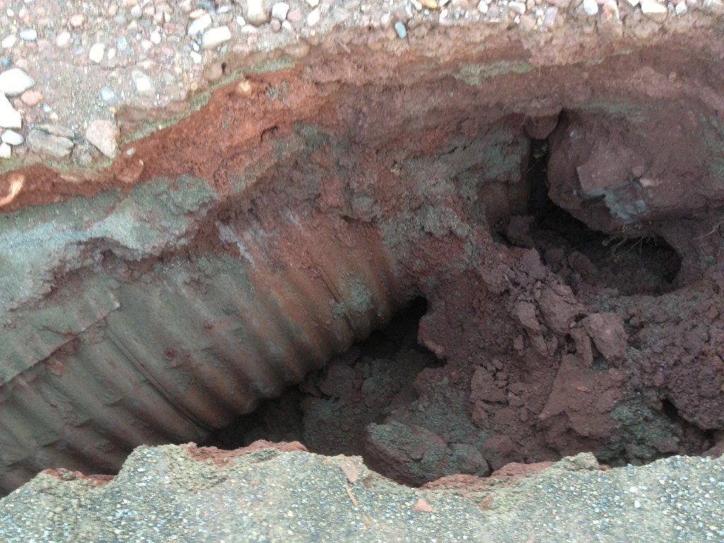 Culvert exposed and road unpassable again!
